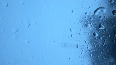 Rainwater drops Falling Down On the car glass Stockbeeldmateriaal 252056345