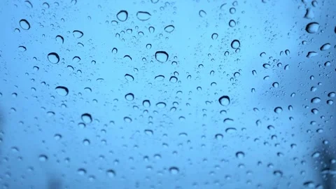 Rainwater drops Falling Down On the car glass Stockbeeldmateriaal 252056352