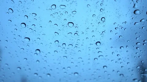 Rainwater drops Falling Down On the car glass Stockbeeldmateriaal 252056354