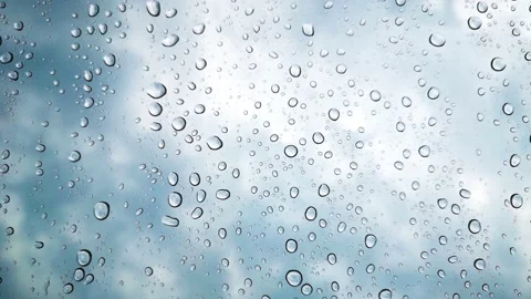 Rainwater drops Falling Down On the Window Glass Vídeos de archivo 183433762