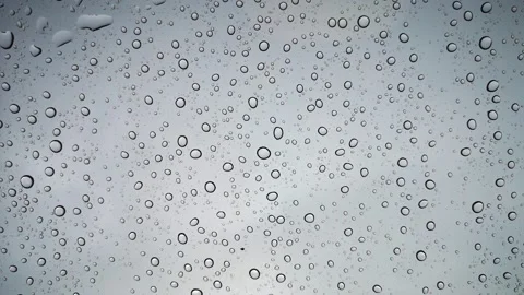 Rainwater drops Falling On the Window Glass, Rain Drops On The Windows Glass, Video stock 137175962