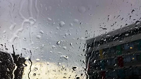 Rainwater falling on the glass and advancing drops Stock-Footage 270156332