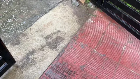 Rainwater Flowing in Courtyard Stockbeeldmateriaal 316225863