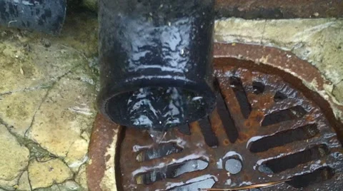 Rainwater Flowing Down A Drain. Stock-Footage 8562551