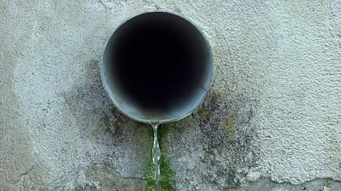 Rainwater flowing out of the plastic pipe Stock Footage 118267314