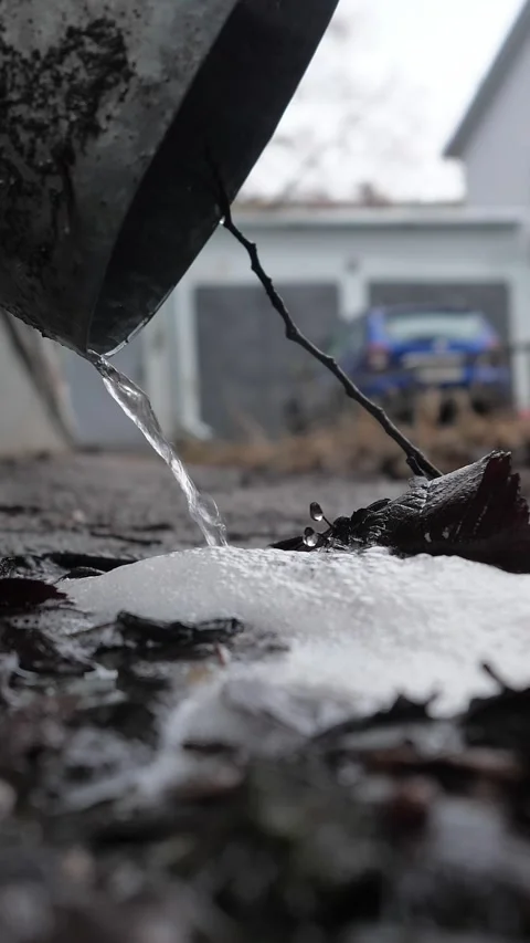 Rainwater flows from a drainpipe. Stock Footage 324791697