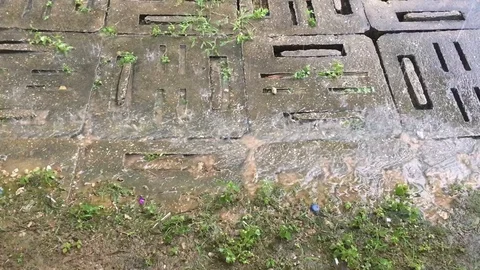 Rainwater flows through the block stone Stock Footage 104969309
