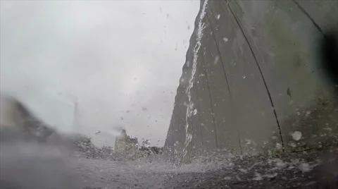 Rainwater runs of pipe slow mo Stock Footage 39678265
