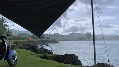 Rainy atmosphere on Bugel Mega Camara Beach Stock Footage 242826138