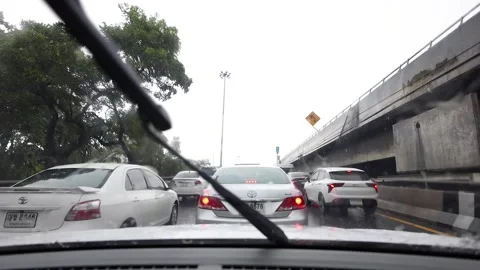 Rainy Bangkok Traffic Through Windshield With Wipers Moving Vídeos de archivo 316462273