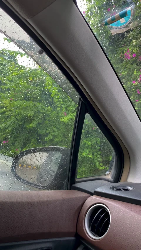 Rainy Car Window and Side Mirror Stockbeeldmateriaal 347216687