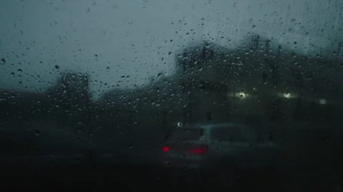 Rainy car window pov of reflective city lights in downtown brooklyn Vídeos de archivo 251218489