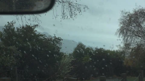 Rainy Car Windscreen &amp; Mirror View Stock Footage 63977740