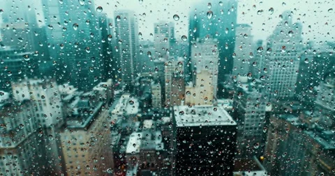 Rainy Cityscape View Through Window on a Cloudy Day 스톡 동영상 323147480