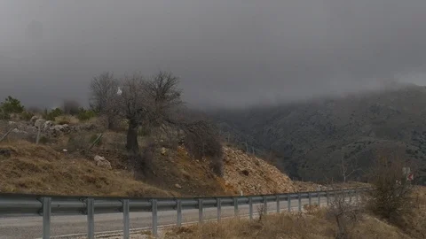 Rainy clouds above the mountain Stock Footage 100544101