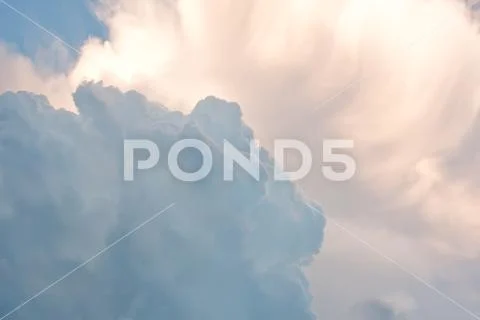 Rainy clouds condensation. Fluffy cloud in sky. Macro view soft focus Stock Photos