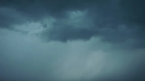 Rainy clouds with lightning in autumn Stock Footage 220549539