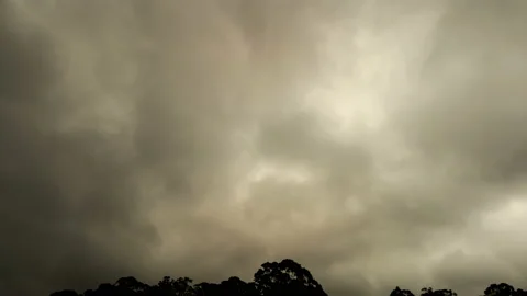 Rainy clouds on sky over the tropical forest Stock Footage 147110355