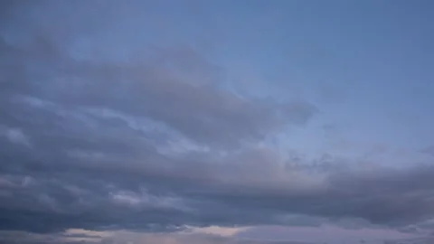Rainy clouds at sunset, time lapse, big clouds Stock Footage 170603188