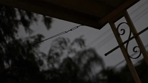 Rainy Cloudy Dark Night, Look out from patio, 4K, Cinematic Stock Footage 237214797