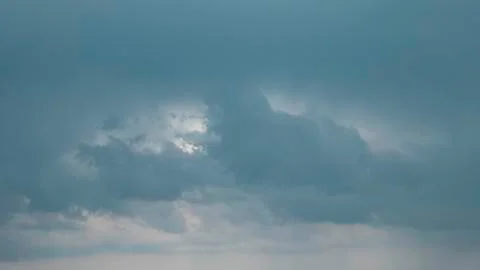 Rainy cloudy sky as a background Stock Photos