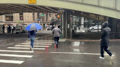 Rainy Commute in NYC Stock Footage 310320609