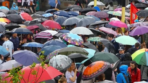 Rainy Crowd with Umbrellas at May 24 Celebration in Varna Stock Footage 321856477