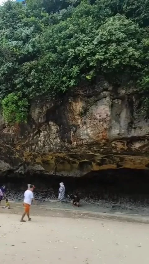 Rainy day in the beach with cliffs Stock Footage 258437332