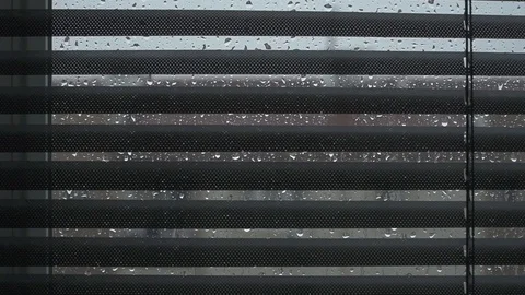 Rainy day behind the window raindrops Stock Footage 112279924