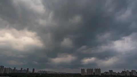 Rainy day black clouds over views of a developed city shanghai skyline in Stock Footage 281221563