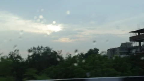Rainy day from a broken window pane. Shooting city life. Stock Footage 245097013