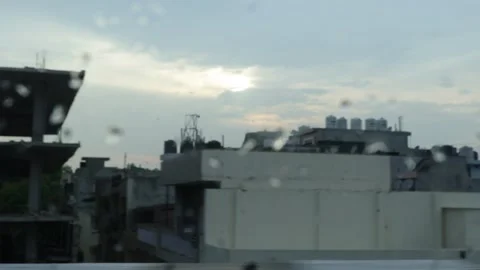 Rainy day from a broken window pane. Shooting city life. Stock Footage 245097041
