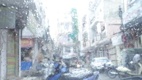 Rainy day from a broken window pane. Shooting Traffic Stock Footage 245097056