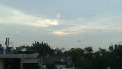 Rainy day from a broken window pane. Shooting city life. Stock Footage 245097295