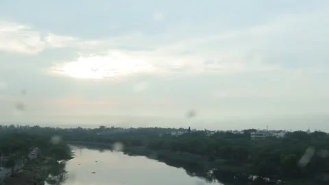 Rainy day from a broken window pane. Shooting city life. Stock Footage 245099932