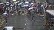 Rainy Day Busy Hong Kong Commercial Financial District Commuters Zebra Crossing  Stock Footage