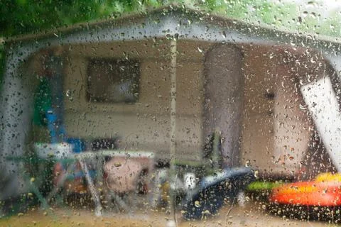 Rainy day in a caravan. Stock Photos