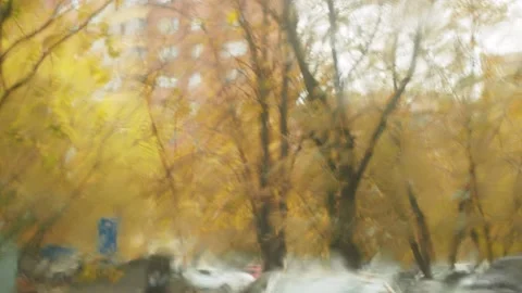 Rainy day in the city through the window Video stock 141338937