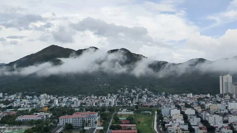 Rainy day in Nha Trang. Clouds floating among mountains. Stock Footage 257528351
