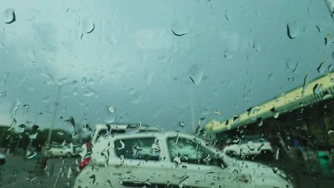 Rainy Day Parking Lot Through Wet Car Window Stock-Footage 337135914