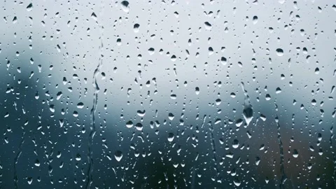 Rainy day , rain falling viewed from window Stock Footage 139797065