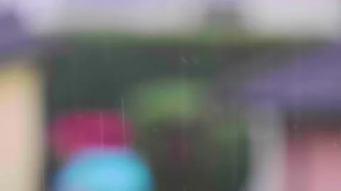 Rainy day , rain falling viewed from window Stock Footage 139873388