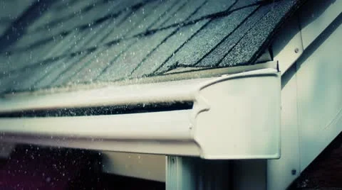 Rainy Day Roof Rain Falls into Gutter Stock Footage