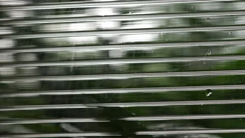 Rainy day through the window Video stock 134677904