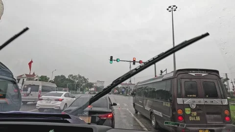 Rainy Day Traffic at Intersection Stock Footage 289921974