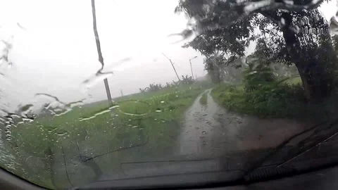 Rainy day view through car windshield Video stock 279717639