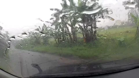Rainy day view through car windshield Video stock 279717785