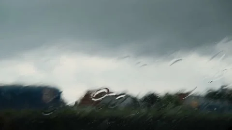 Rainy day, water runs down on window Stock Footage 158456510