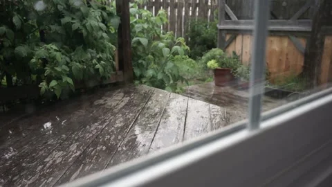 Rainy days at the cottage can be quite relaxing and soothing, shot in 24 FPS Stock Footage 179026828