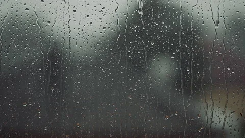 Rainy days ,heavy rain falling on the window surface Video stock 150317084